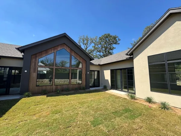 New construction home after post-build cleaning by Stonevale Exterior Co. showing pristine move-in ready exterior